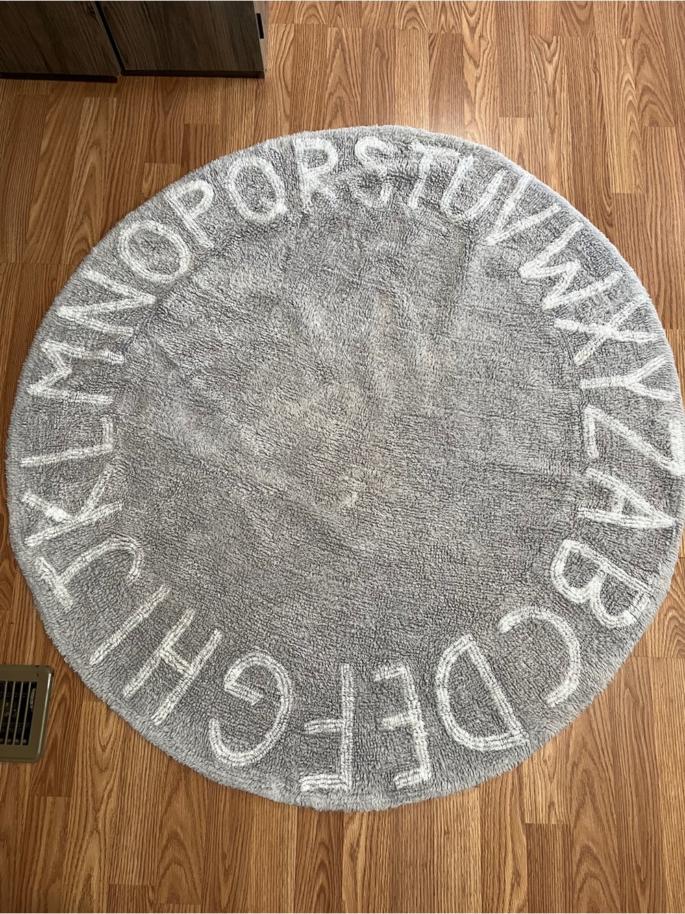 Round Gray Alphabet Rug - Neutral Nursery Accent
